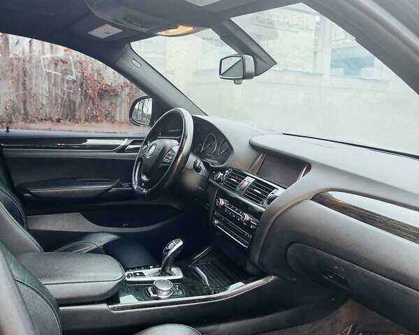 Черный БМВ Х4, объемом двигателя 2 л и пробегом 140 тыс. км за 20500 $, фото 1 на Automoto.ua