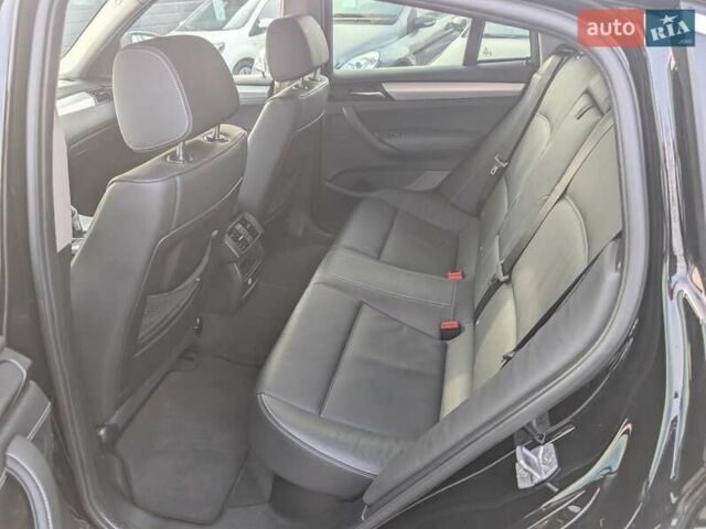 Черный БМВ Х4, объемом двигателя 2 л и пробегом 95 тыс. км за 20850 $, фото 32 на Automoto.ua