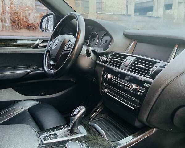 Черный БМВ Х4, объемом двигателя 2 л и пробегом 140 тыс. км за 20500 $, фото 3 на Automoto.ua