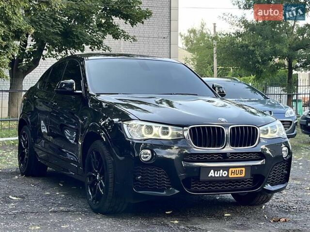 Черный БМВ Х4, объемом двигателя 2 л и пробегом 106 тыс. км за 26500 $, фото 4 на Automoto.ua