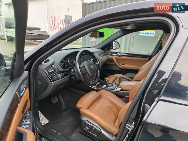 Чорний БМВ Х4, об'ємом двигуна 2 л та пробігом 102 тис. км за 23800 $, фото 11 на Automoto.ua