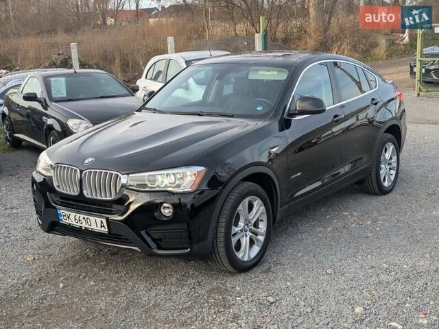 Черный БМВ Х4, объемом двигателя 2 л и пробегом 95 тыс. км за 20850 $, фото 4 на Automoto.ua