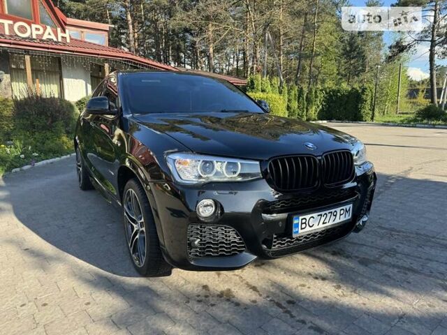 Чорний БМВ Х4, об'ємом двигуна 2 л та пробігом 180 тис. км за 25500 $, фото 2 на Automoto.ua