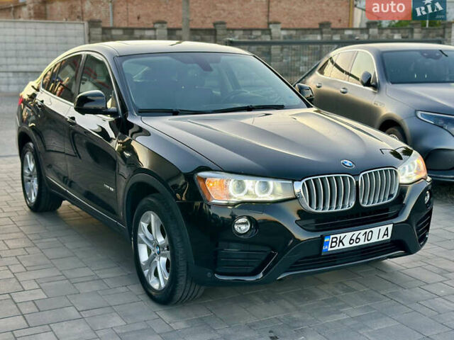 Черный БМВ Х4, объемом двигателя 2 л и пробегом 97 тыс. км за 19500 $, фото 4 на Automoto.ua