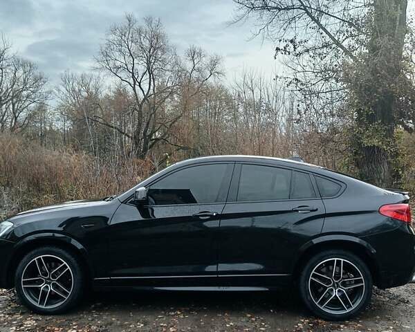 Черный БМВ Х4, объемом двигателя 2 л и пробегом 140 тыс. км за 20500 $, фото 11 на Automoto.ua