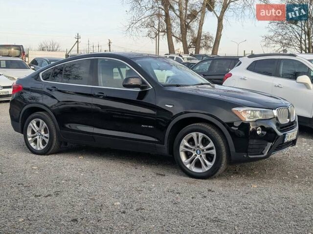 Черный БМВ Х4, объемом двигателя 2 л и пробегом 95 тыс. км за 20850 $, фото 12 на Automoto.ua