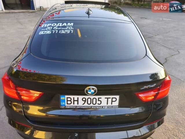 Чорний БМВ Х4, об'ємом двигуна 2 л та пробігом 102 тис. км за 23800 $, фото 2 на Automoto.ua