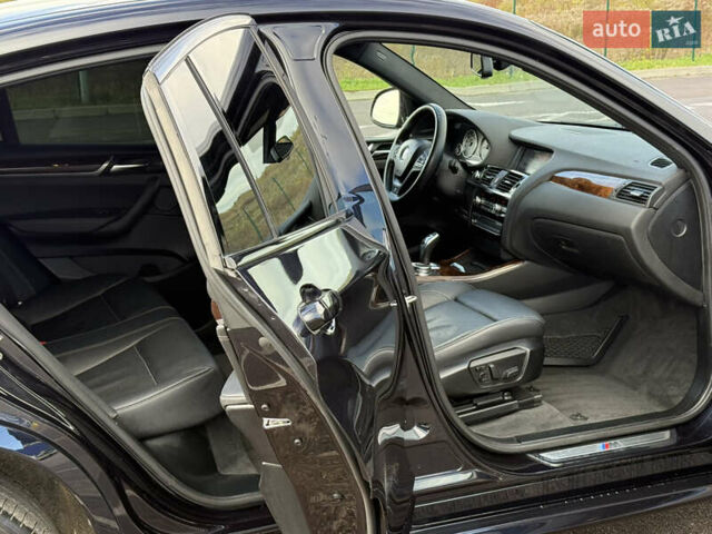 Чорний БМВ Х4, об'ємом двигуна 2 л та пробігом 230 тис. км за 19500 $, фото 11 на Automoto.ua