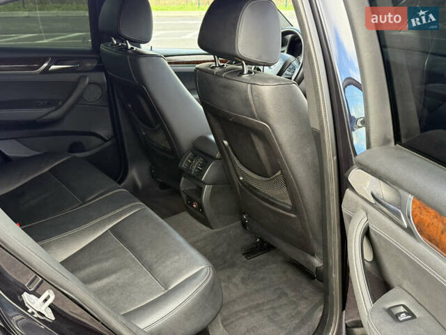 Чорний БМВ Х4, об'ємом двигуна 2 л та пробігом 230 тис. км за 19500 $, фото 7 на Automoto.ua