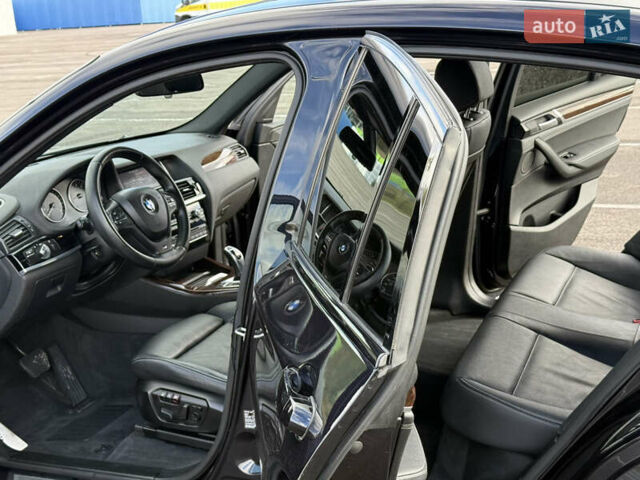 Чорний БМВ Х4, об'ємом двигуна 2 л та пробігом 230 тис. км за 19500 $, фото 8 на Automoto.ua