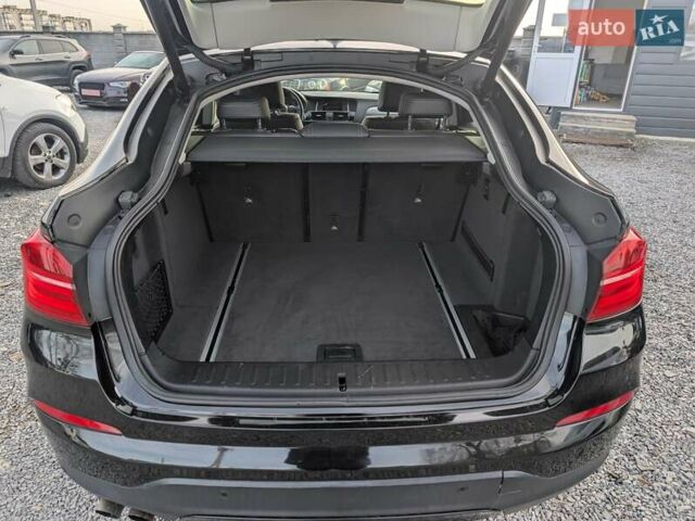 Черный БМВ Х4, объемом двигателя 2 л и пробегом 95 тыс. км за 20850 $, фото 34 на Automoto.ua