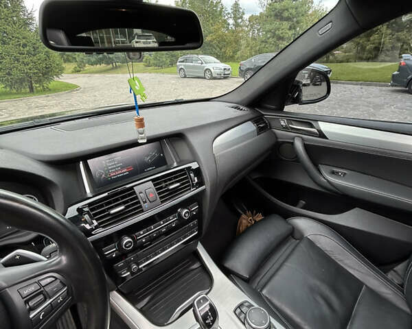 Черный БМВ Х4, объемом двигателя 2 л и пробегом 144 тыс. км за 18900 $, фото 18 на Automoto.ua