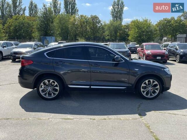 Черный БМВ Х4, объемом двигателя 2 л и пробегом 112 тыс. км за 21900 $, фото 3 на Automoto.ua