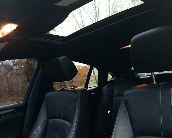 Черный БМВ Х4, объемом двигателя 2 л и пробегом 140 тыс. км за 20500 $, фото 14 на Automoto.ua