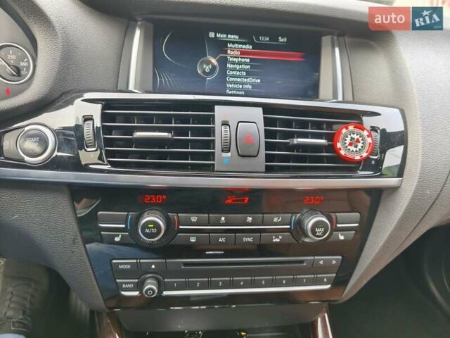 Чорний БМВ Х4, об'ємом двигуна 2 л та пробігом 102 тис. км за 23800 $, фото 13 на Automoto.ua