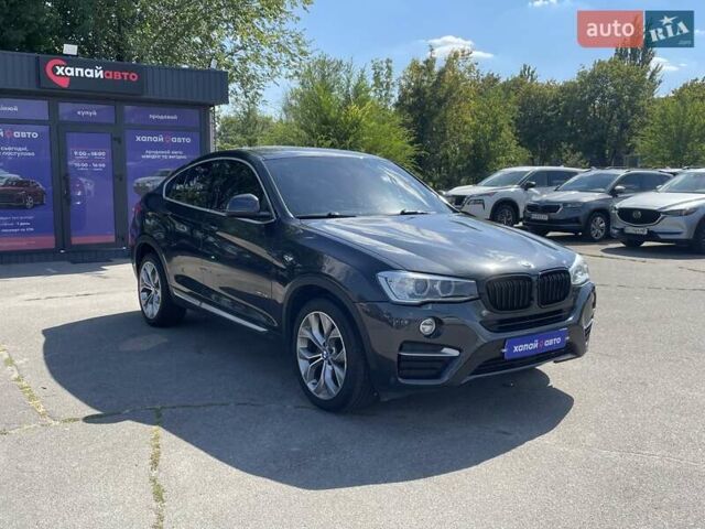 Черный БМВ Х4, объемом двигателя 2 л и пробегом 112 тыс. км за 21900 $, фото 2 на Automoto.ua