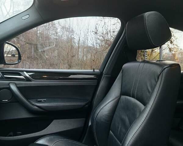 Черный БМВ Х4, объемом двигателя 2 л и пробегом 140 тыс. км за 20500 $, фото 17 на Automoto.ua