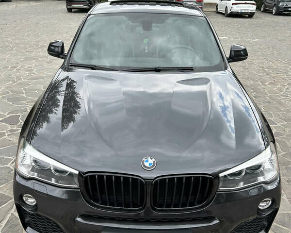 Черный БМВ Х4, объемом двигателя 2 л и пробегом 144 тыс. км за 18900 $, фото 1 на Automoto.ua