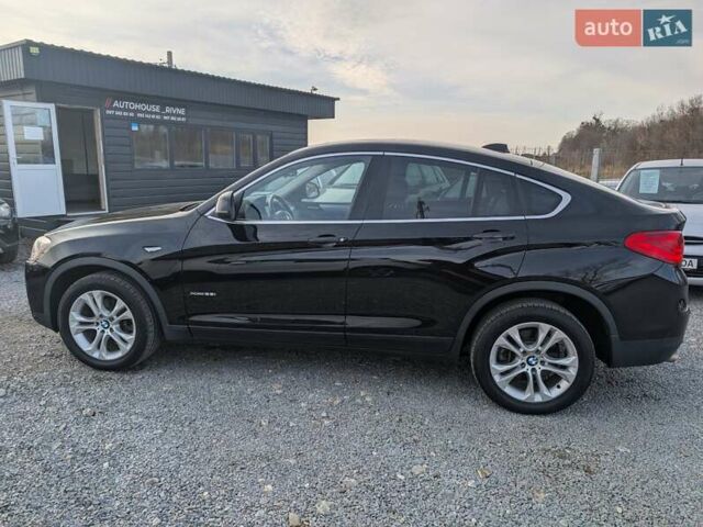 Черный БМВ Х4, объемом двигателя 2 л и пробегом 95 тыс. км за 20850 $, фото 21 на Automoto.ua