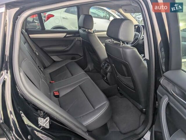 Черный БМВ Х4, объемом двигателя 2 л и пробегом 95 тыс. км за 20850 $, фото 36 на Automoto.ua