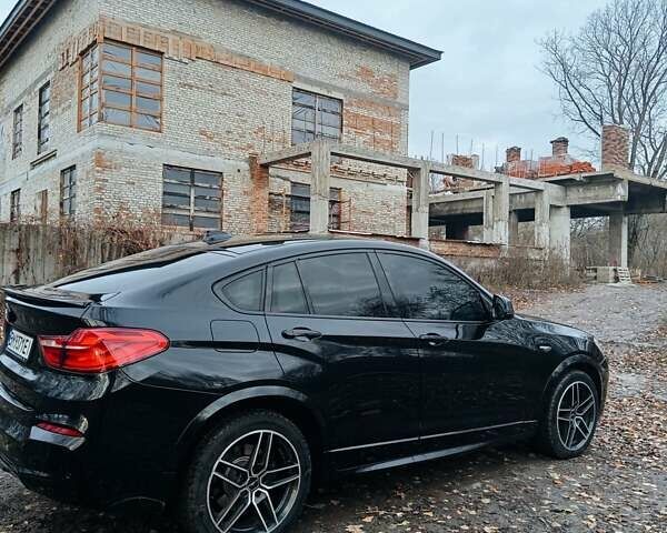 Черный БМВ Х4, объемом двигателя 2 л и пробегом 140 тыс. км за 20500 $, фото 5 на Automoto.ua
