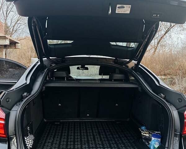 Черный БМВ Х4, объемом двигателя 2 л и пробегом 140 тыс. км за 20500 $, фото 7 на Automoto.ua