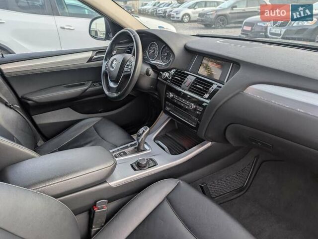 Черный БМВ Х4, объемом двигателя 2 л и пробегом 95 тыс. км за 20850 $, фото 47 на Automoto.ua