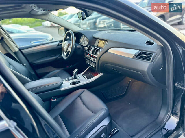 Черный БМВ Х4, объемом двигателя 2 л и пробегом 97 тыс. км за 19500 $, фото 15 на Automoto.ua