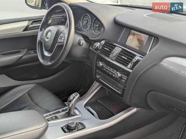 Черный БМВ Х4, объемом двигателя 2 л и пробегом 95 тыс. км за 20850 $, фото 46 на Automoto.ua