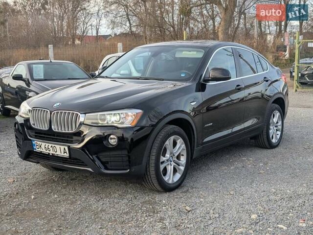 Черный БМВ Х4, объемом двигателя 2 л и пробегом 95 тыс. км за 20850 $, фото 3 на Automoto.ua