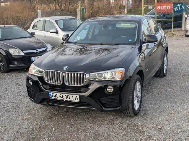 Черный БМВ Х4, объемом двигателя 2 л и пробегом 95 тыс. км за 20850 $, фото 5 на Automoto.ua