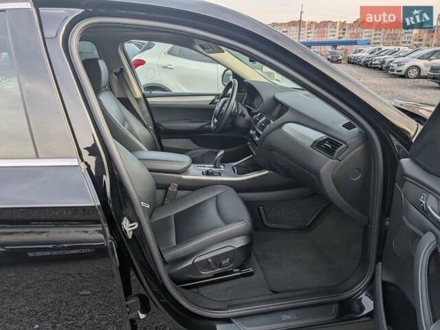 Черный БМВ Х4, объемом двигателя 2 л и пробегом 95 тыс. км за 20850 $, фото 43 на Automoto.ua