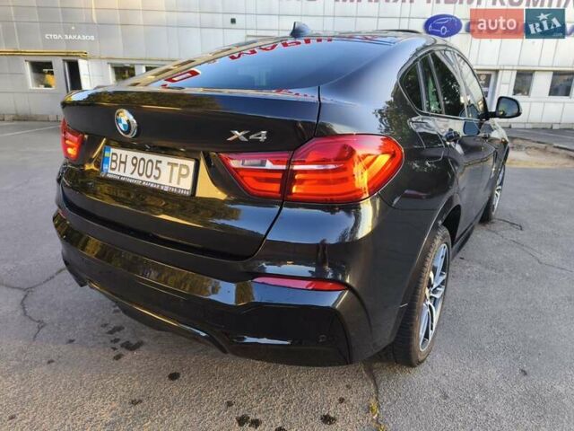 Чорний БМВ Х4, об'ємом двигуна 2 л та пробігом 102 тис. км за 23800 $, фото 7 на Automoto.ua
