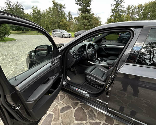 Черный БМВ Х4, объемом двигателя 2 л и пробегом 144 тыс. км за 18900 $, фото 14 на Automoto.ua