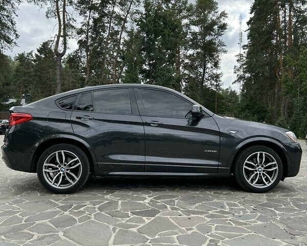 Черный БМВ Х4, объемом двигателя 2 л и пробегом 144 тыс. км за 18900 $, фото 4 на Automoto.ua