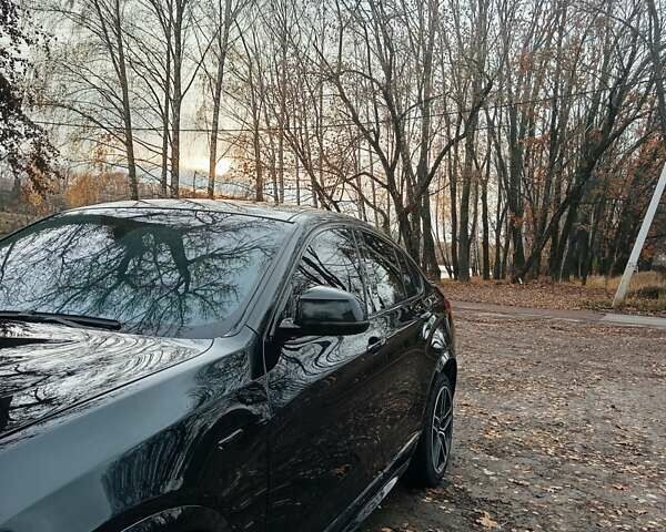 Черный БМВ Х4, объемом двигателя 2 л и пробегом 140 тыс. км за 20500 $, фото 8 на Automoto.ua