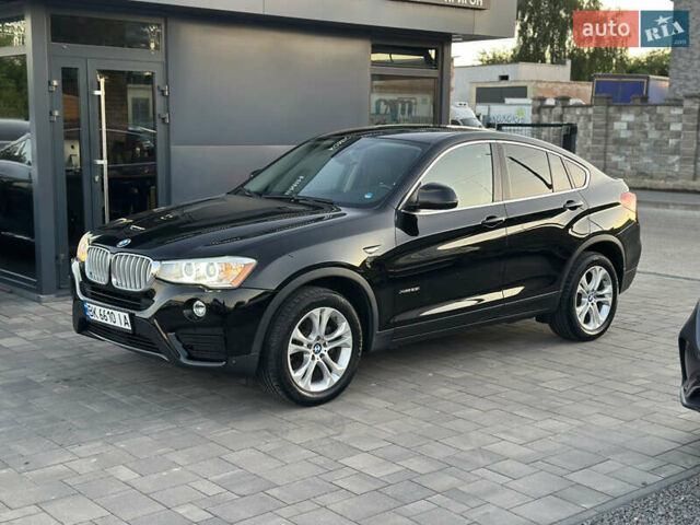 Черный БМВ Х4, объемом двигателя 2 л и пробегом 97 тыс. км за 19500 $, фото 1 на Automoto.ua