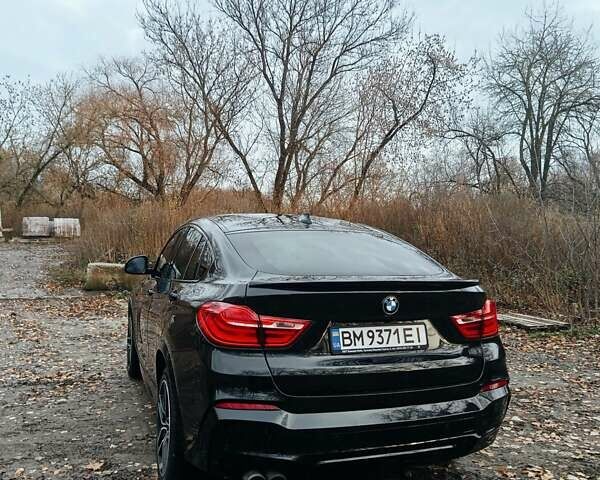 Черный БМВ Х4, объемом двигателя 2 л и пробегом 140 тыс. км за 20500 $, фото 6 на Automoto.ua