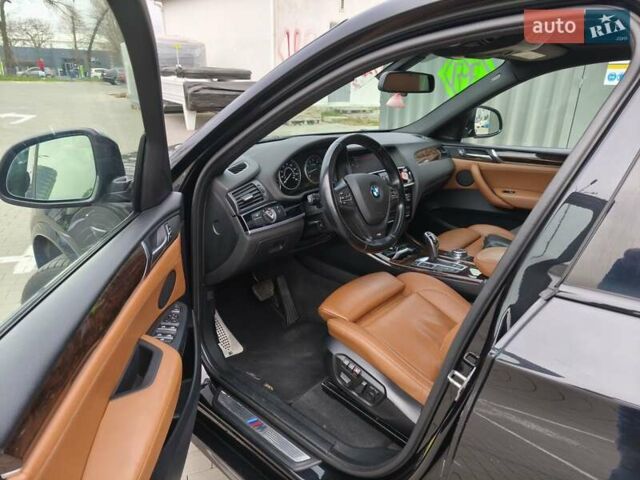 Чорний БМВ Х4, об'ємом двигуна 2 л та пробігом 102 тис. км за 23800 $, фото 12 на Automoto.ua
