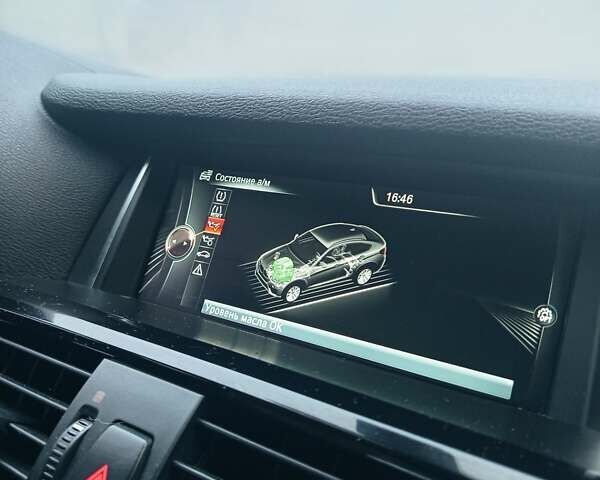 Черный БМВ Х4, объемом двигателя 2 л и пробегом 140 тыс. км за 20500 $, фото 18 на Automoto.ua