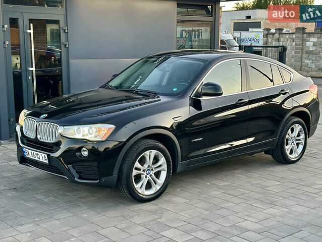 Черный БМВ Х4, объемом двигателя 2 л и пробегом 97 тыс. км за 19500 $, фото 2 на Automoto.ua