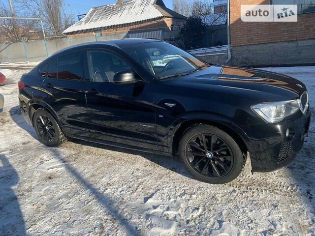 Чорний БМВ Х4, об'ємом двигуна 2 л та пробігом 185 тис. км за 28900 $, фото 2 на Automoto.ua