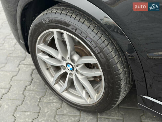 Чорний БМВ Х4, об'ємом двигуна 2 л та пробігом 181 тис. км за 23999 $, фото 33 на Automoto.ua