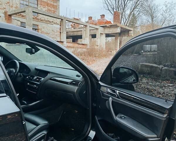Черный БМВ Х4, объемом двигателя 2 л и пробегом 140 тыс. км за 20500 $, фото 4 на Automoto.ua