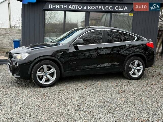 Черный БМВ Х4, объемом двигателя 2 л и пробегом 176 тыс. км за 19900 $, фото 2 на Automoto.ua