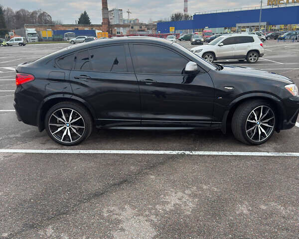 Черный БМВ Х4, объемом двигателя 2.98 л и пробегом 77 тыс. км за 33800 $, фото 12 на Automoto.ua