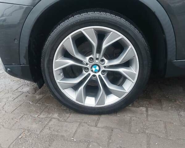 Черный БМВ Х4, объемом двигателя 2 л и пробегом 256 тыс. км за 14800 $, фото 14 на Automoto.ua