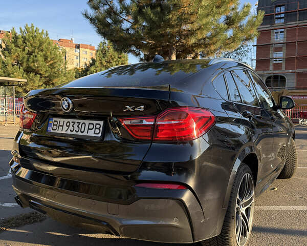 Чорний БМВ Х4, об'ємом двигуна 2 л та пробігом 97 тис. км за 25500 $, фото 1 на Automoto.ua