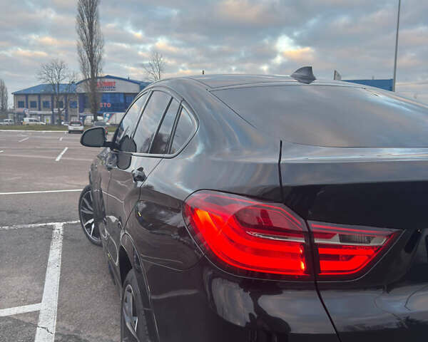 Черный БМВ Х4, объемом двигателя 2.98 л и пробегом 77 тыс. км за 33800 $, фото 6 на Automoto.ua