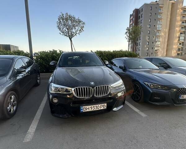 БМВ Х4 2016 в Черновцах на Automoto.ua Черный БМВ Х4, объемом двигателя 2 л и пробегом 94 тыс. км за 32000 $, фото 6 на Automoto.ua